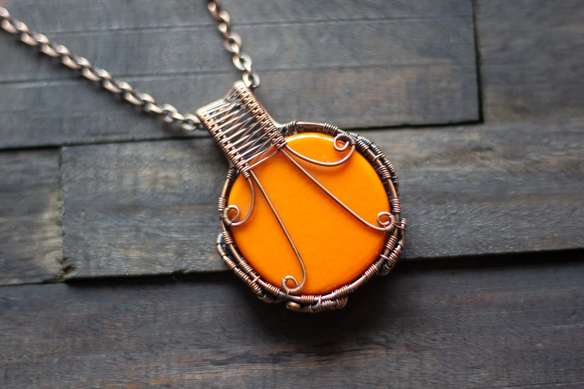 Copper Wire Wrapped Pendant with Steampunk Man on Orange Fused Glass