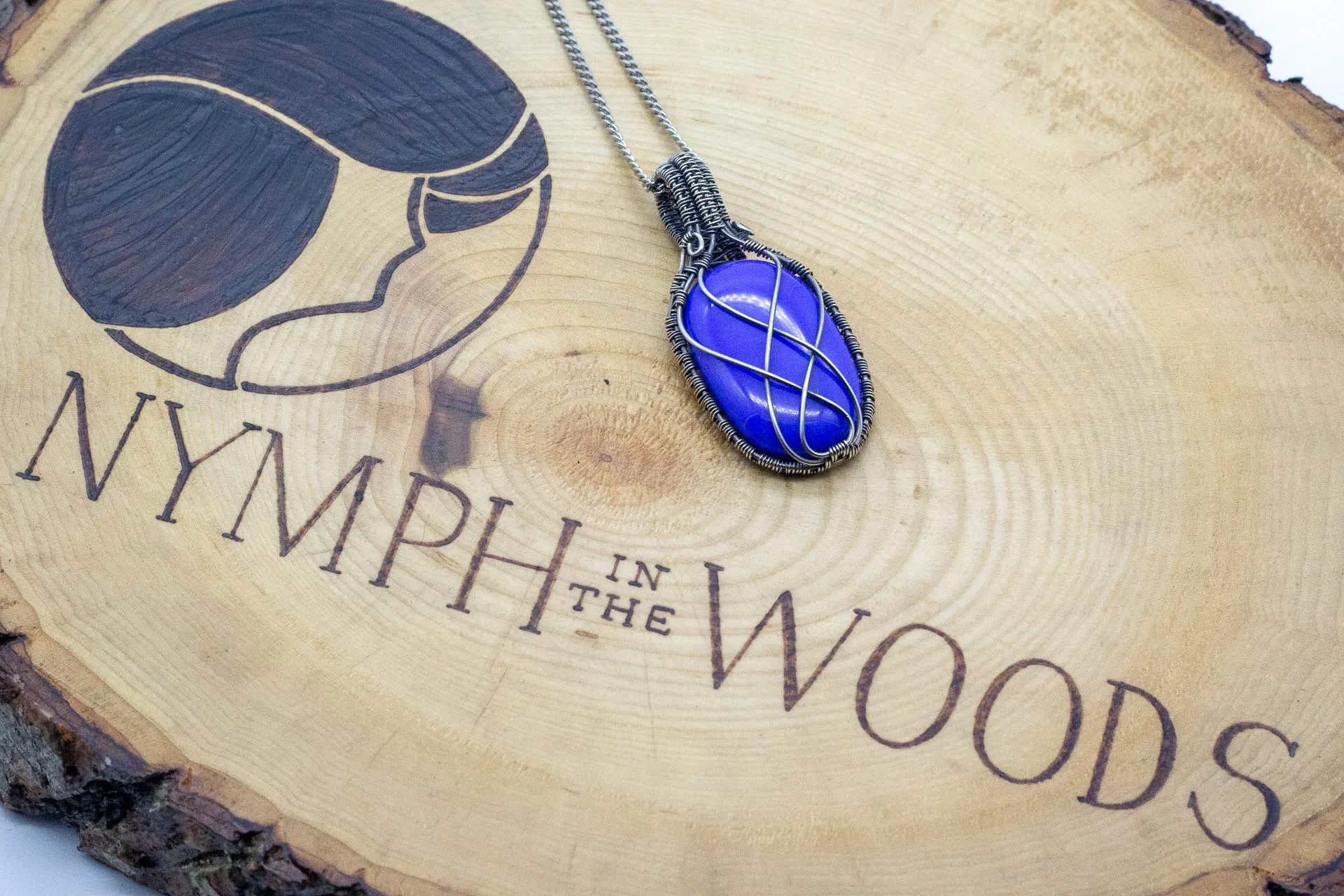 Elegant Blue Fused Glass Pendant with Sterling Silver Wire Wrapping