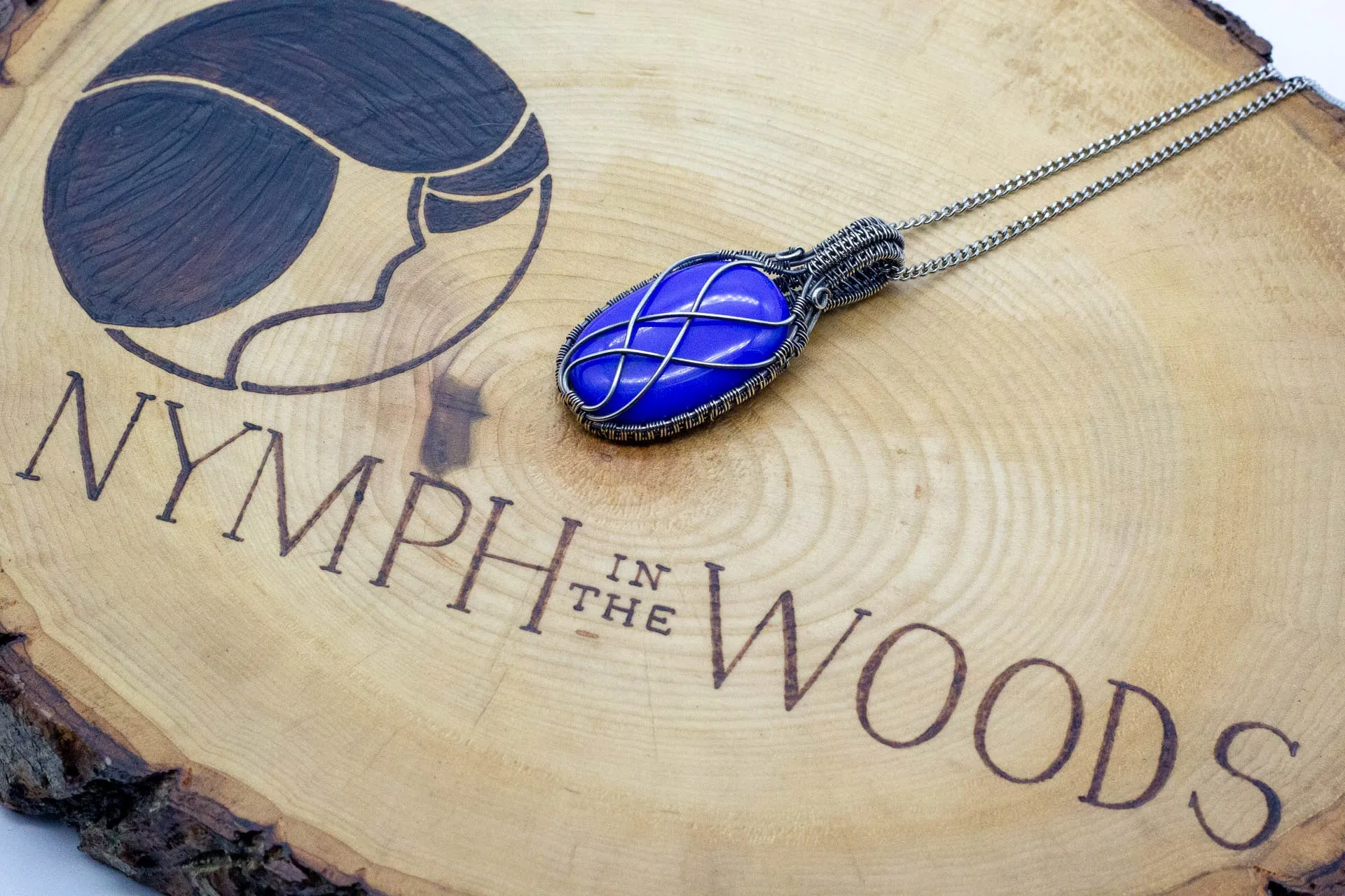 Elegant Blue Fused Glass Pendant with Sterling Silver Wire Wrapping