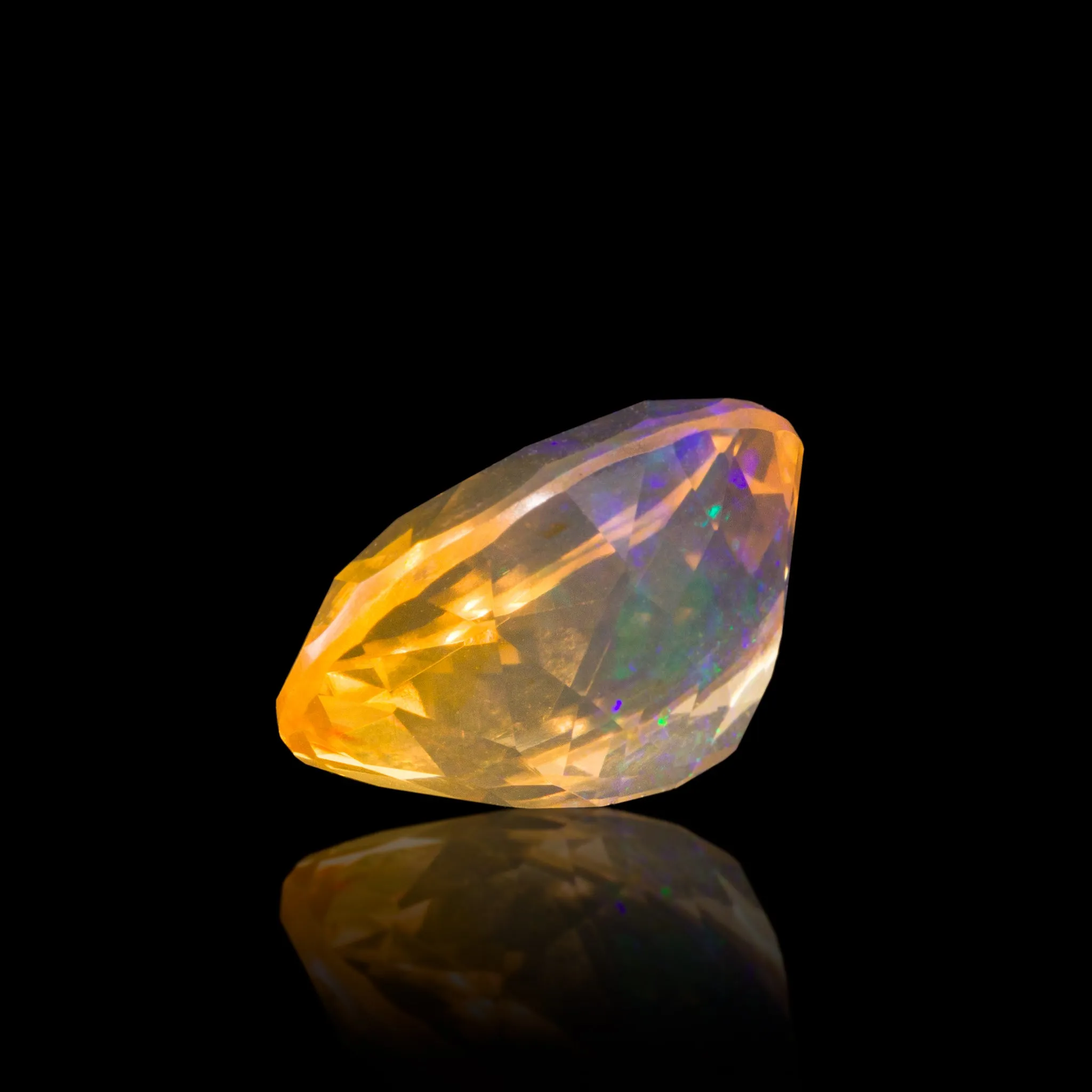 Golden Opal 5.64 Carat Faceted Gemstone - Mexico
