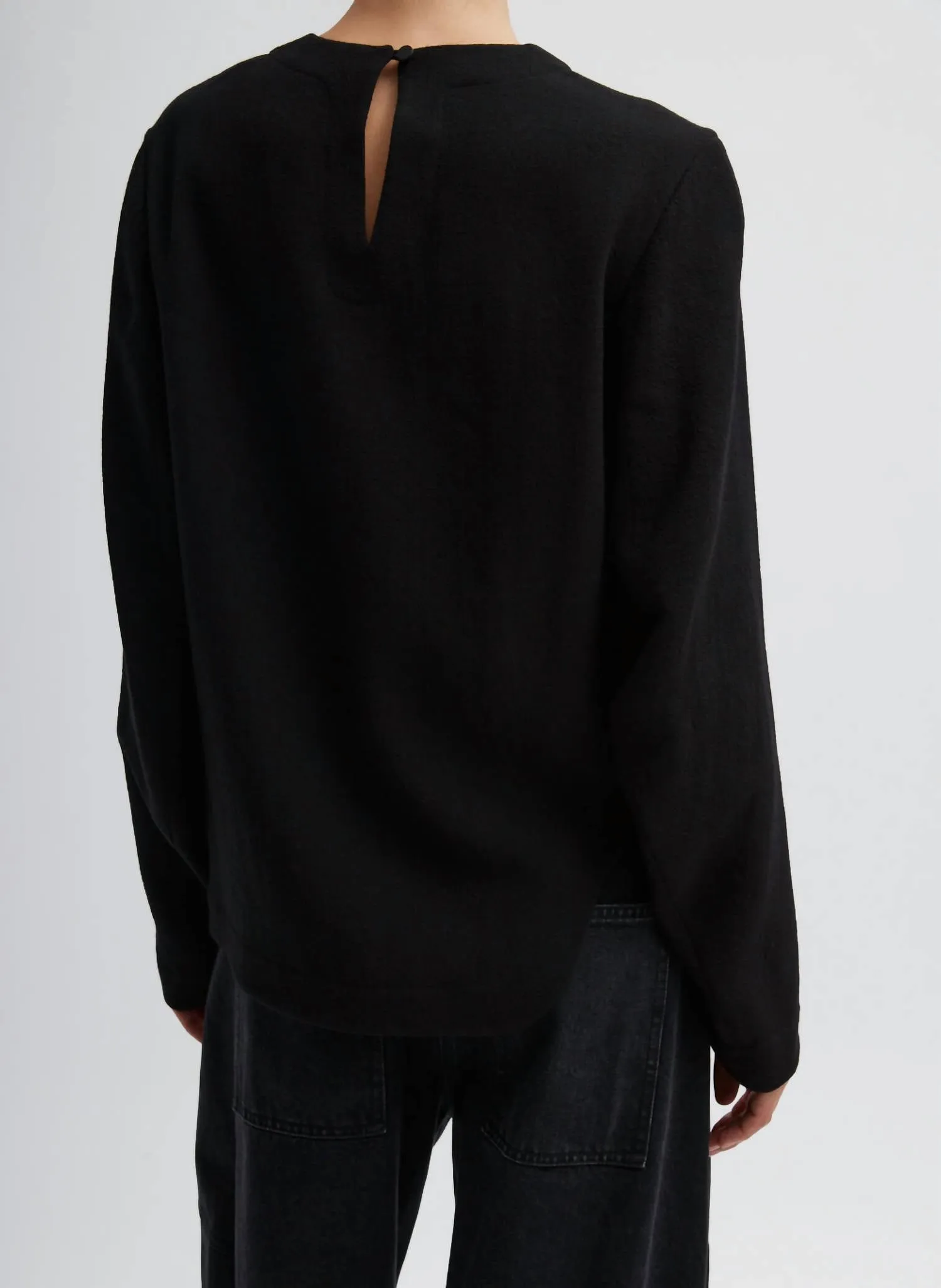 Melee Crepe Long Sleeve Cropped Top In Black