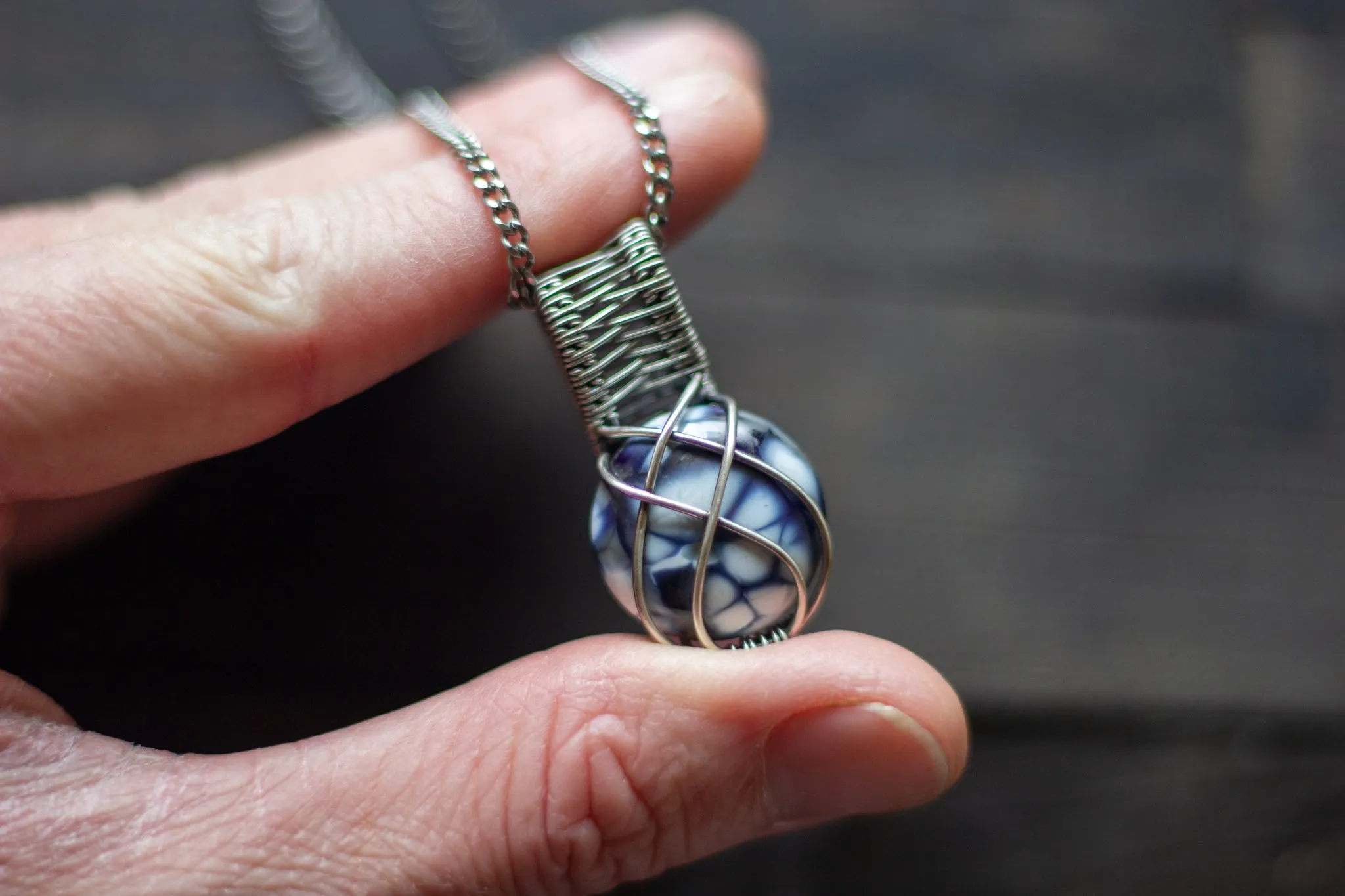 Silver, Blue, and White Crisscross Sterling Silver Wire Wrapped Pendant