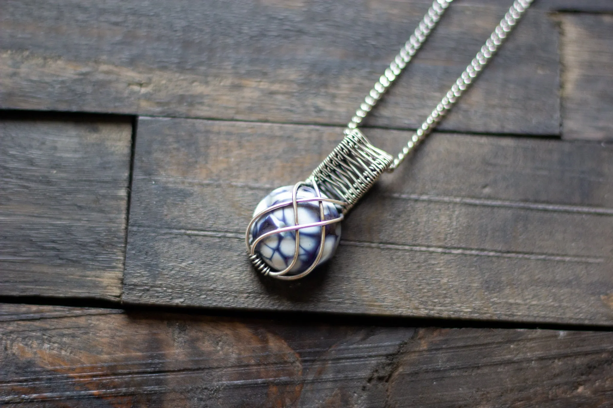 Silver, Blue, and White Crisscross Sterling Silver Wire Wrapped Pendant