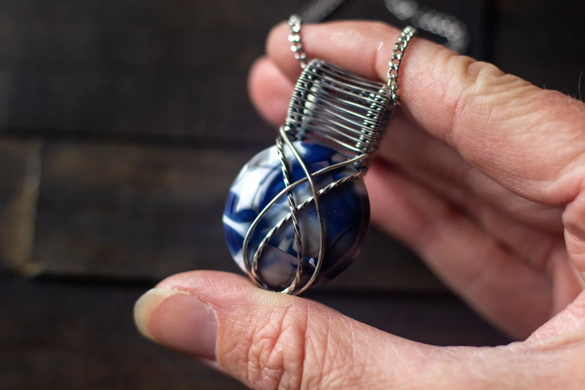 Silver, Blue, and White Crisscross Sterling Silver Wire Wrapped Pendant