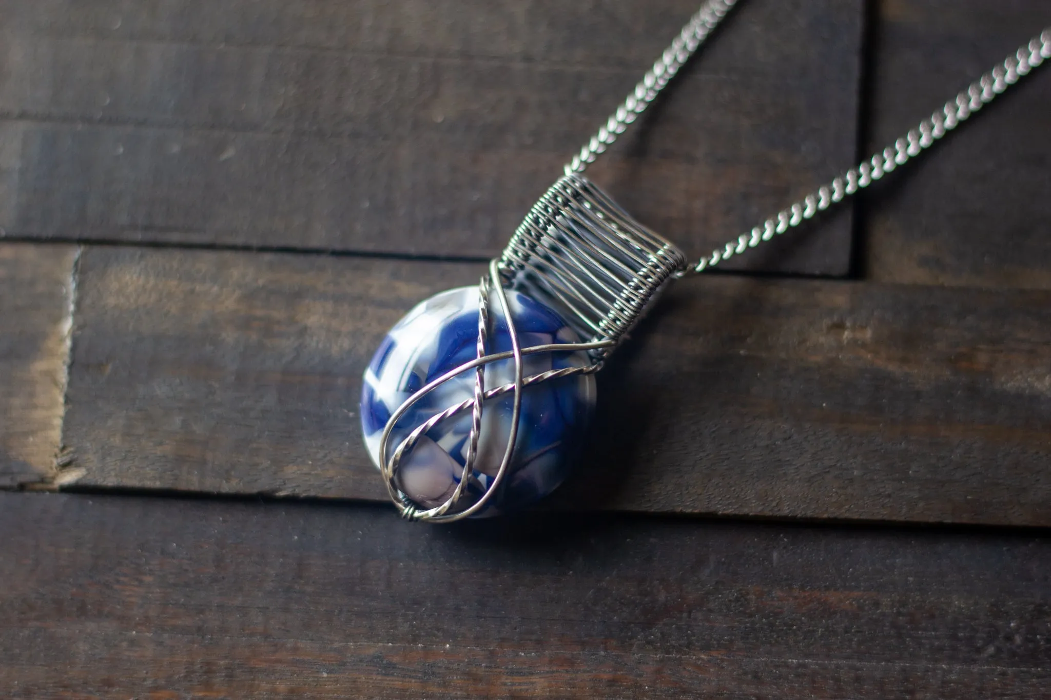 Silver, Blue, and White Crisscross Sterling Silver Wire Wrapped Pendant