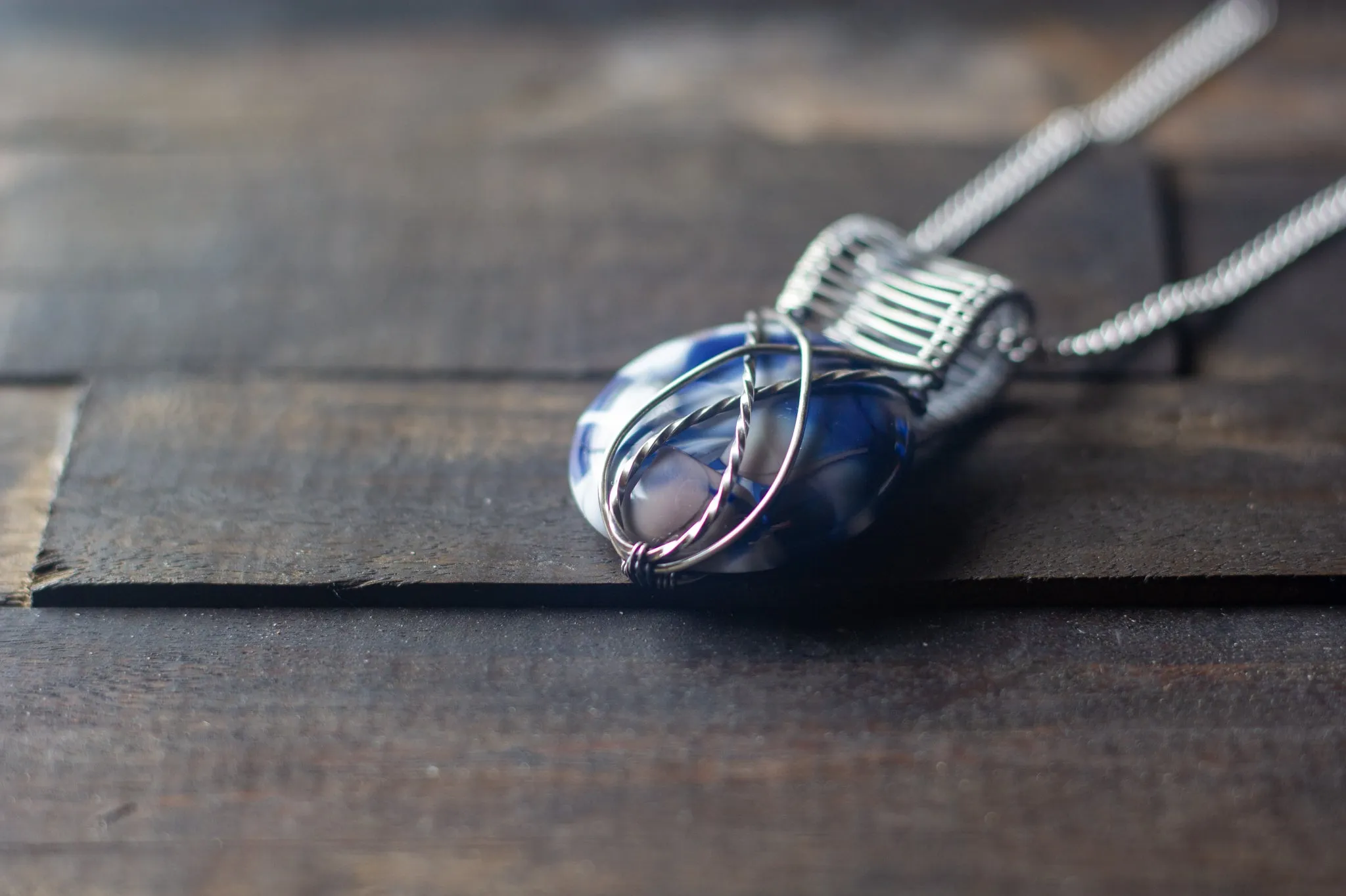 Silver, Blue, and White Crisscross Sterling Silver Wire Wrapped Pendant