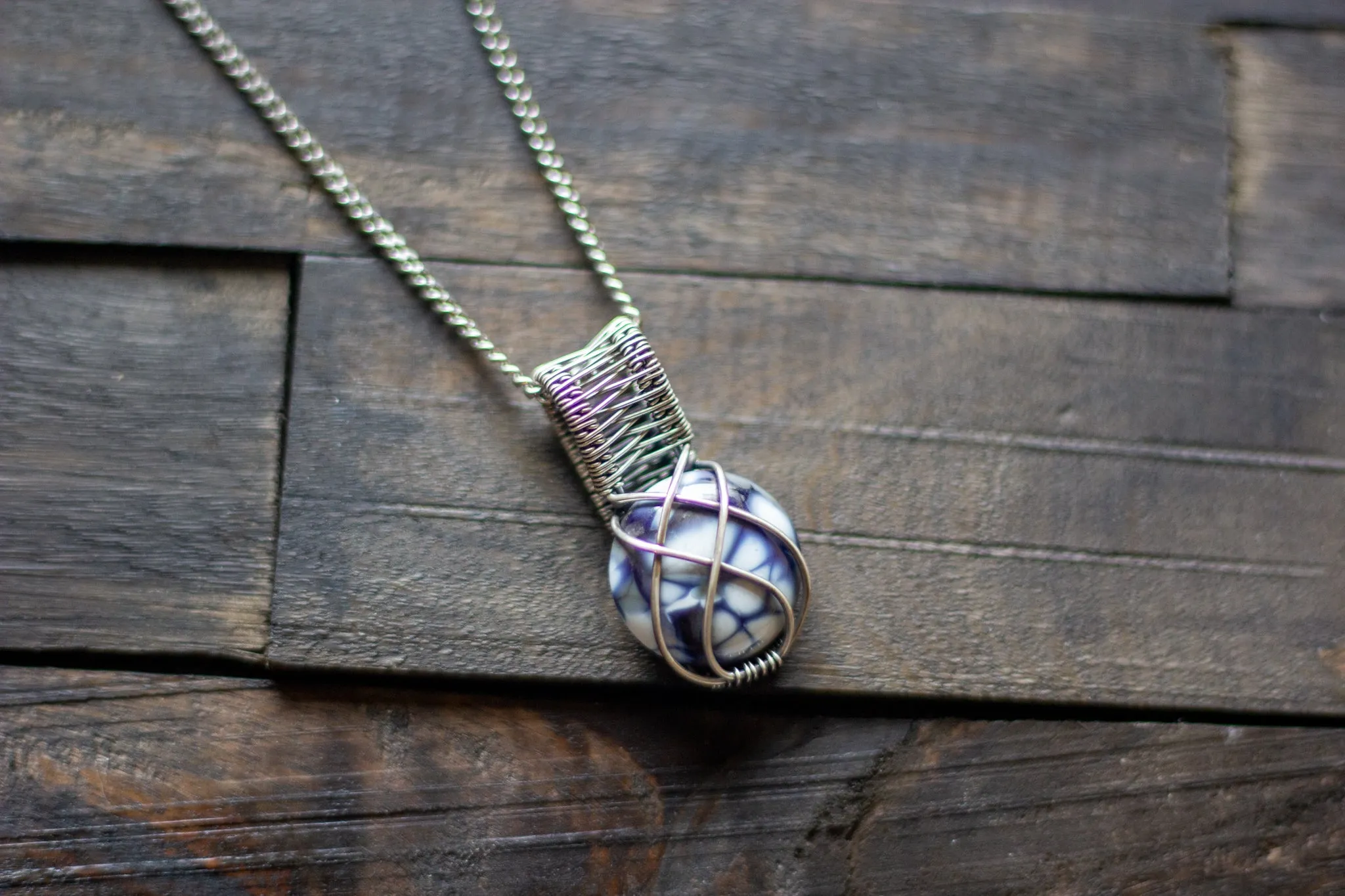 Silver, Blue, and White Crisscross Sterling Silver Wire Wrapped Pendant
