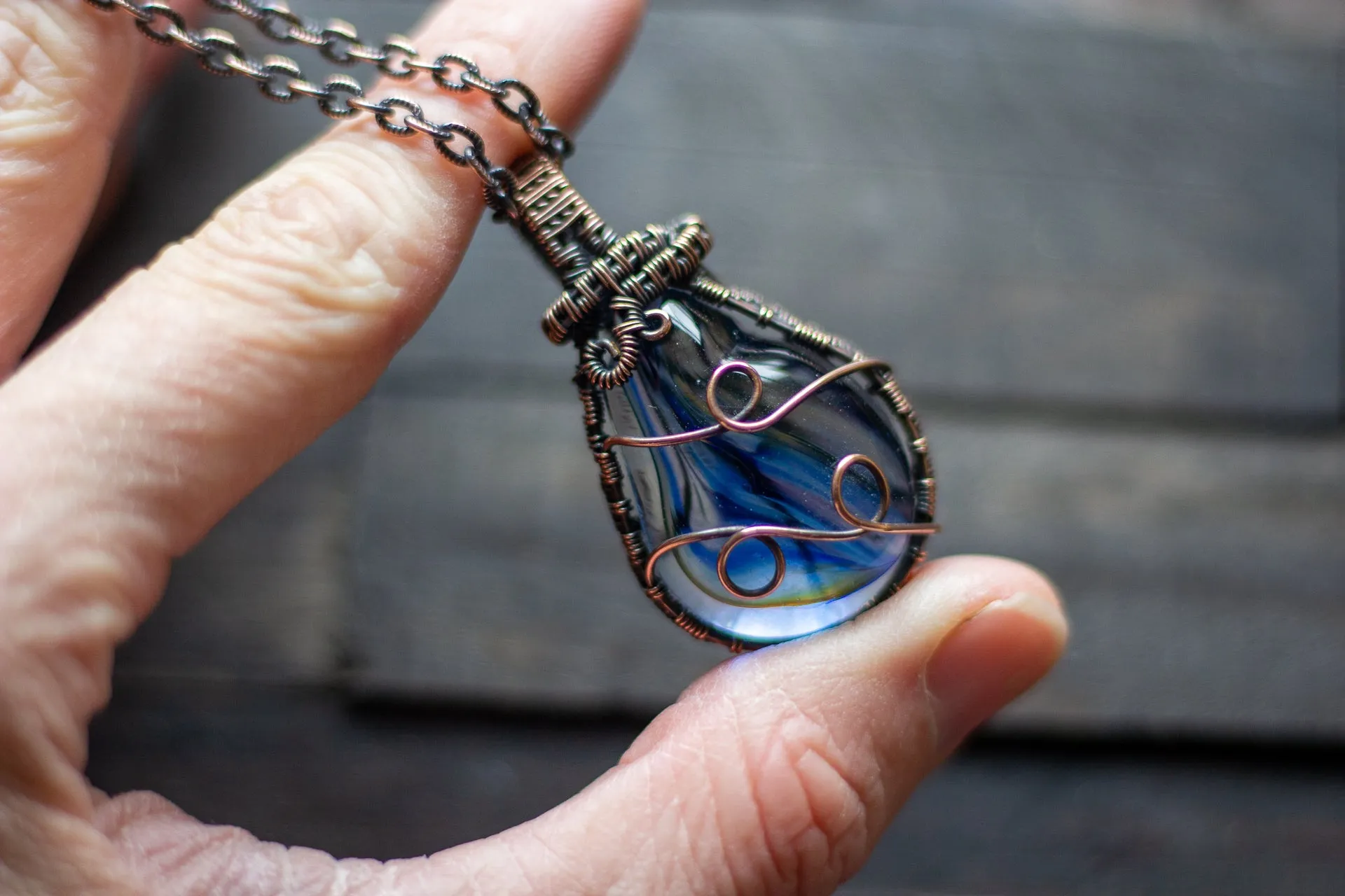 Transparent Streaked Blue Fused Glass Pendant with Copper Wire Wrapping